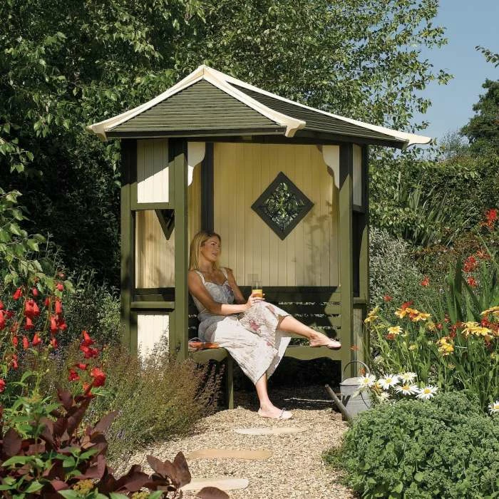 Haven Wooden Three Seater Corner Arbour With Green And White Detailing By Rowlinson® - 2.5m 3 Haven Wooden Three Seater Corner Arbour With Green And White Detailing By Rowlinson® - 2.5m